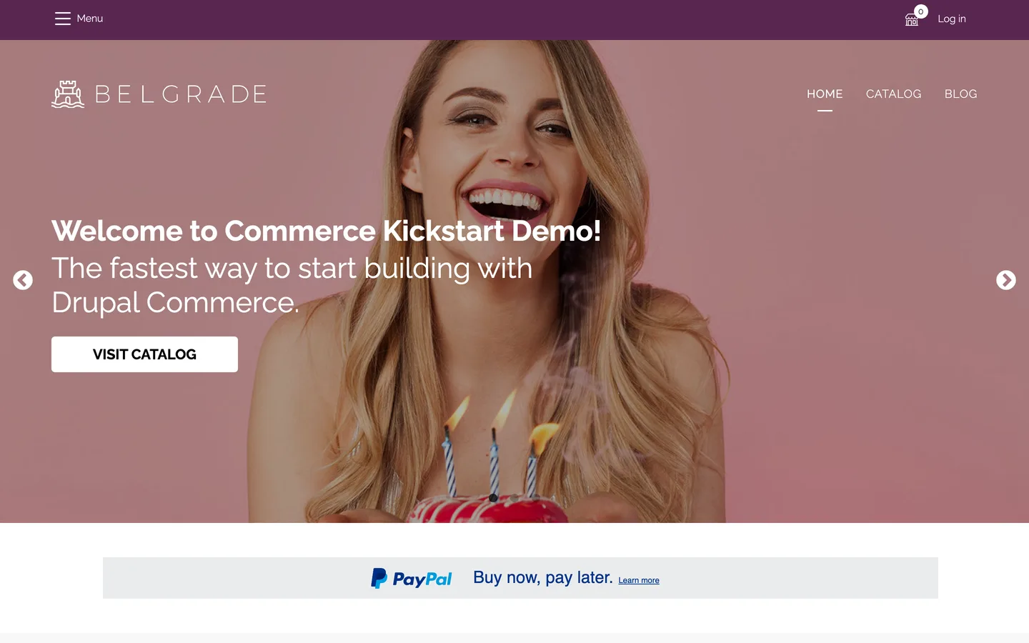 Belgrade theme on the Commerce Kickstart demo with a purple top bar, cart and login, and the Belgrade logo over a pink hero photo
