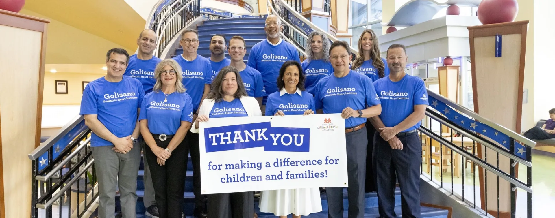 Vanderbilt University Medical Center care team posing with a thank-you sign at the children's hospital